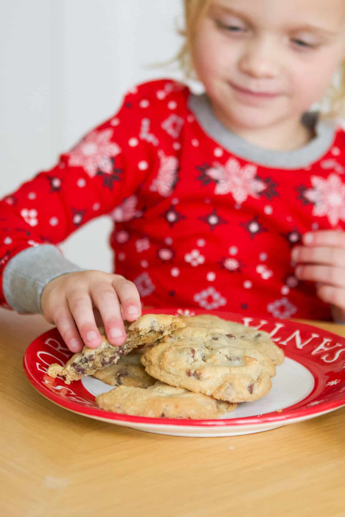 Rory grabbing a cookie from a plate