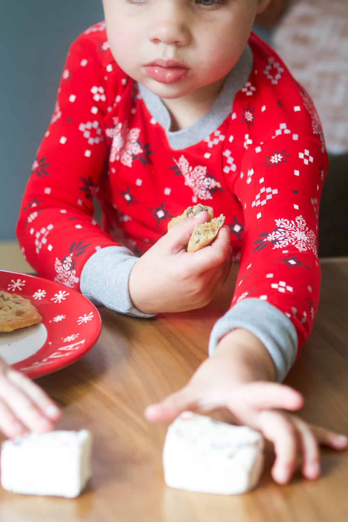 Ellis grabbing a marshmallow