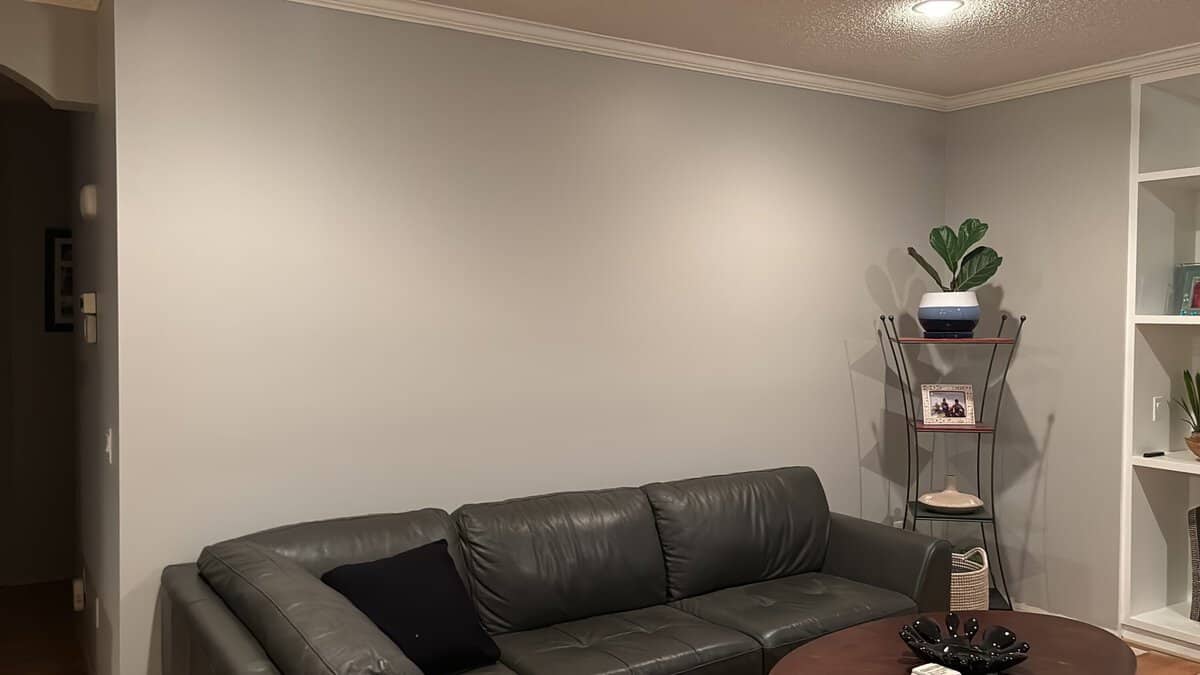 blank wall above a couch