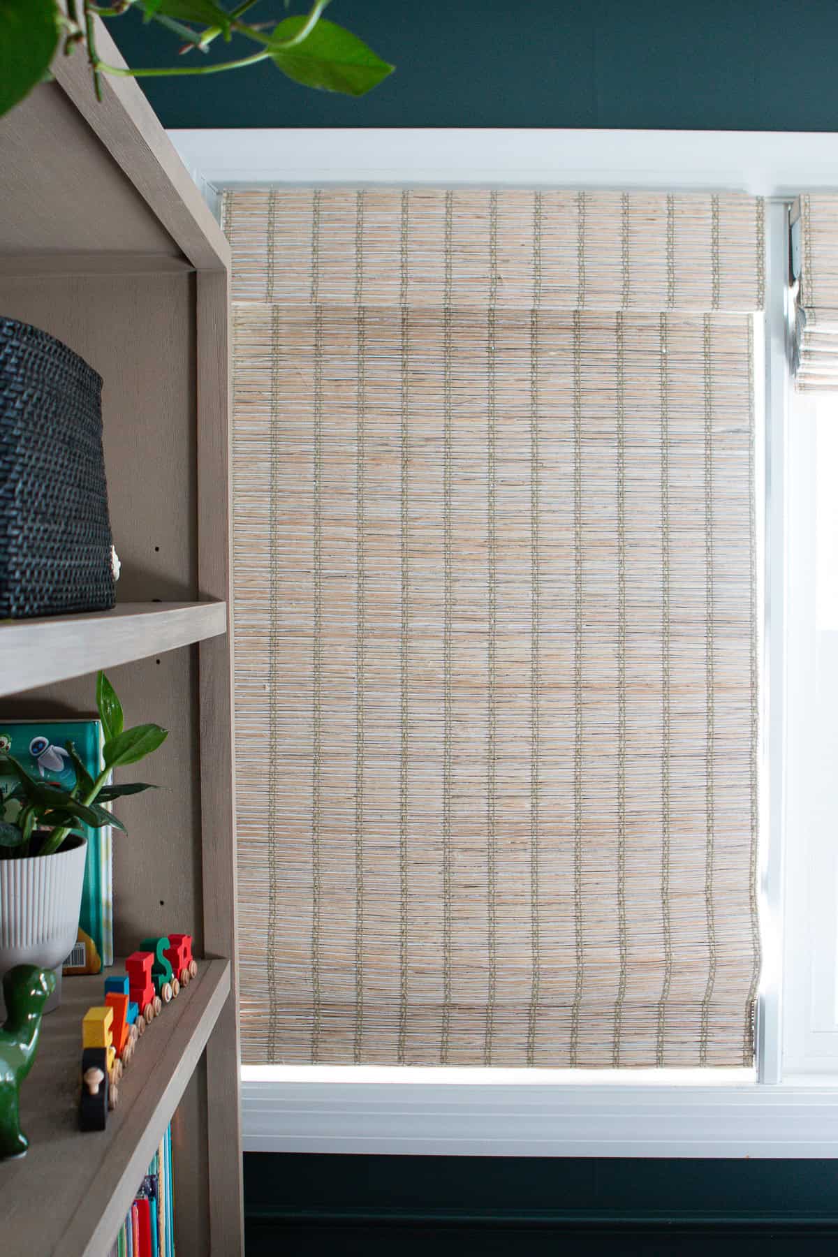 Blackout bamboo shades in a little boy's room