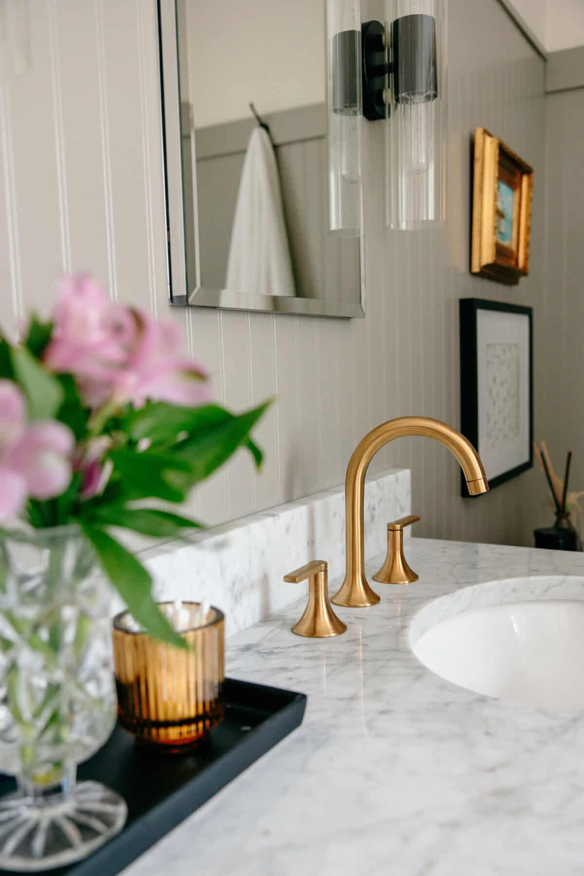 Gold faucet in a bathroom